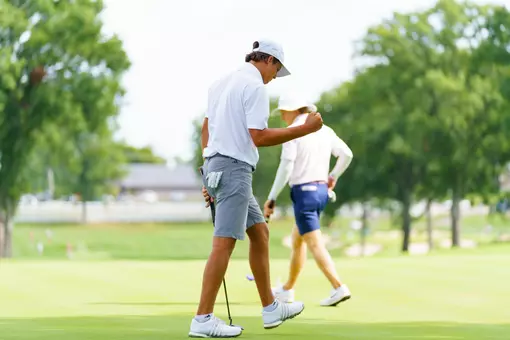 Barron Mundy celebrating a birdie putt.