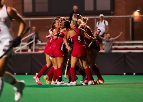 Louisville Field Hockey celebrates after Chloe Plumb's goal against Boston College