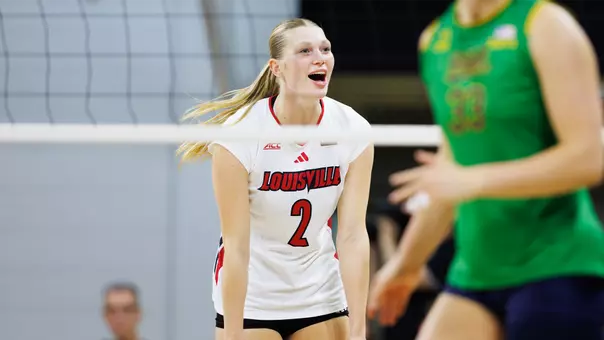 Chloe Meester celebrates a kill against Notre Dame