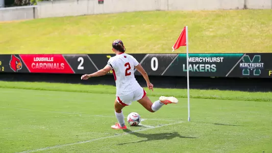 Betsy Huckaby taking corner kick