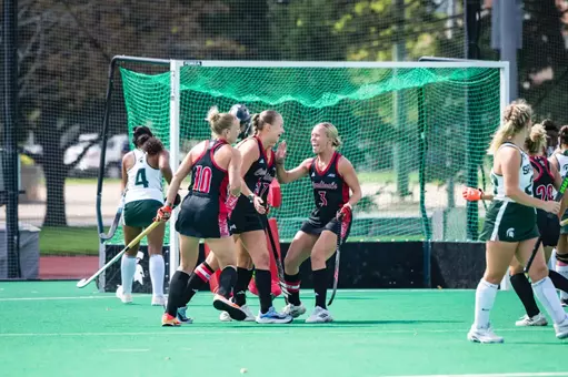 Louisville celebrates Chloe Plumb's goal at Michigan State
