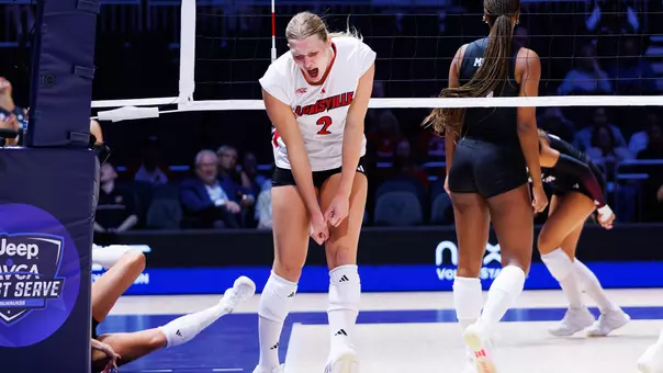 Chloe Meester celebrates a kill against Texas A&M
