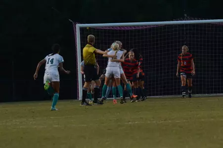 Kacey Kelley and Sam Patterson celebrate the game's only goal in the 1-0 victory.