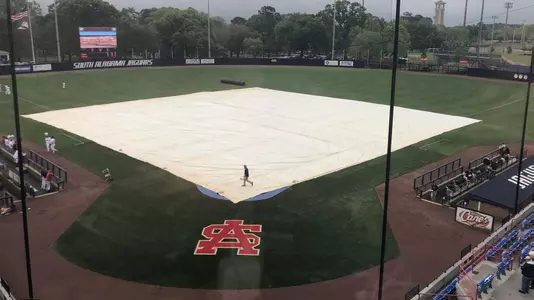 tarp on field at South Alabama