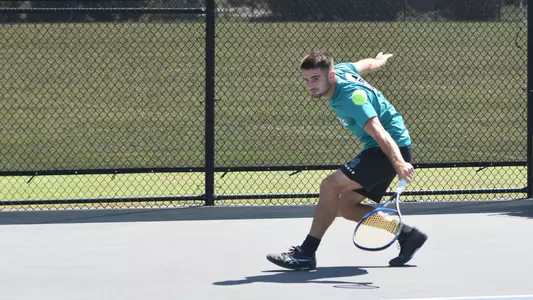 Talic returning a backhand