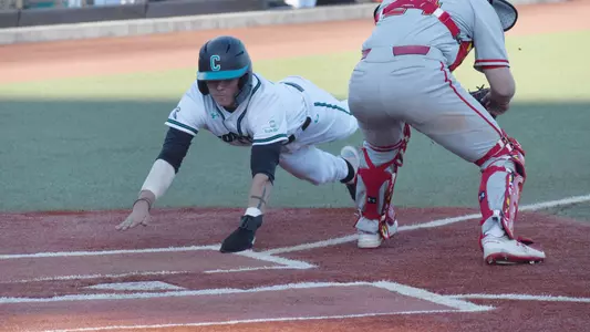Scott McKeon sliding into home versus Maryland (2-29-2020)