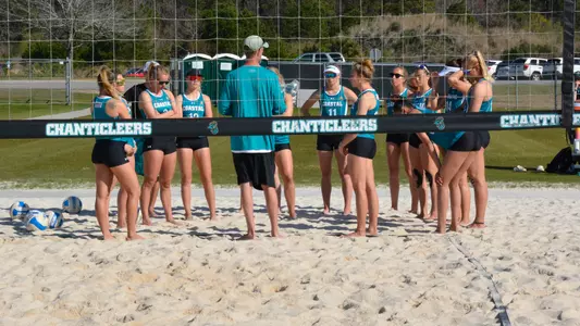 Beach Volleyball team huddle