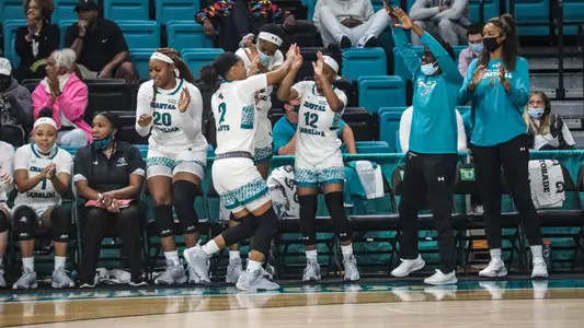 Sideline celebrating a made shot