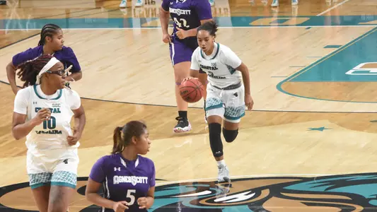 Jordyn Newsome bringing ball up court