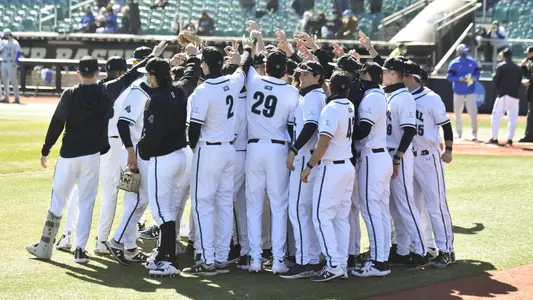 Coastal Baseball pregame huddle versus Duke (Feb. 20, 2021)