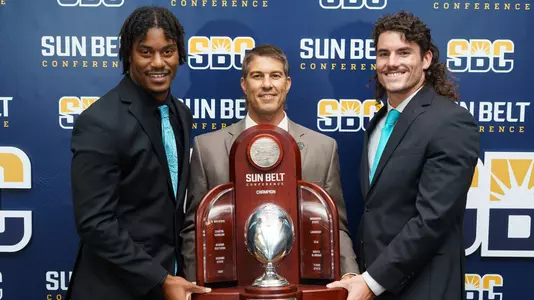 Coach Chadwell and players with Trophy at 2021 SBC Media Day