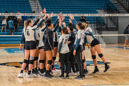 Post Game Huddle on Floor