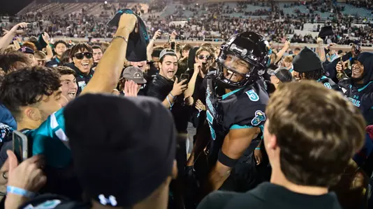 Players and Students Celebrating on the Field vs. App State (11-3-2022)