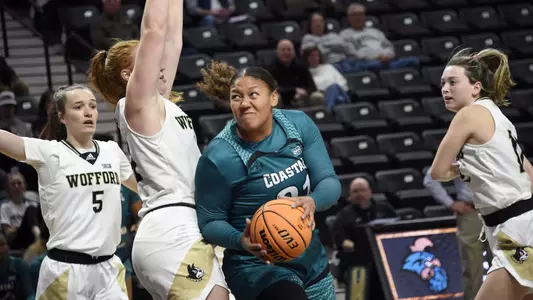 Aja driving to the basket