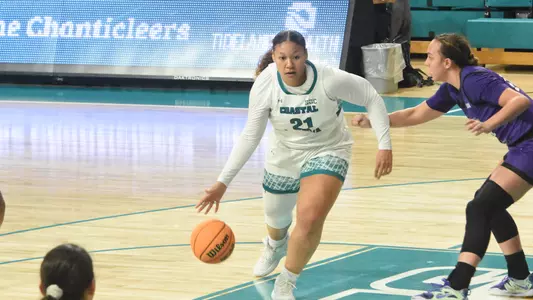 Aja driving the basket