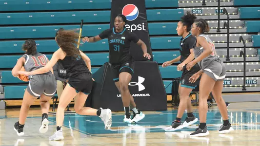 Belinga with the defense in the paint