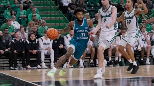 Jomaru Brown on baseline at Marshall (1-7-2023)