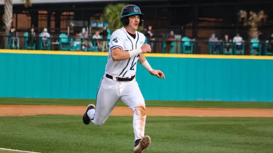 Tanner Garrison scores a run in the win over Creighton (2-25-2023)