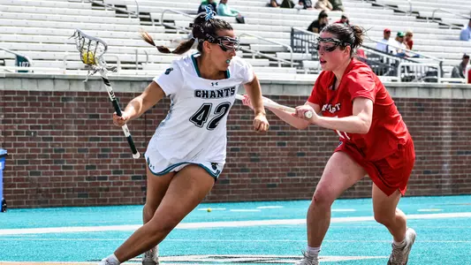 Downey driving against Marist defender