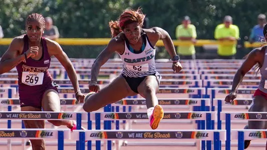 Alexis Glasco races in the 100-meter hurdles at the 2023 SBC Outdoor Championships