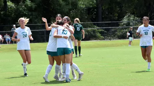 WSoc celebrate