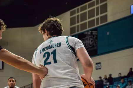Noah Amenhauser backs up defender against USC Upstate on 12/1/2024