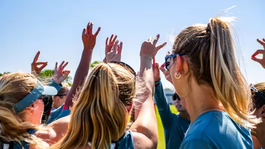 Beach Volleyball Team Huddle