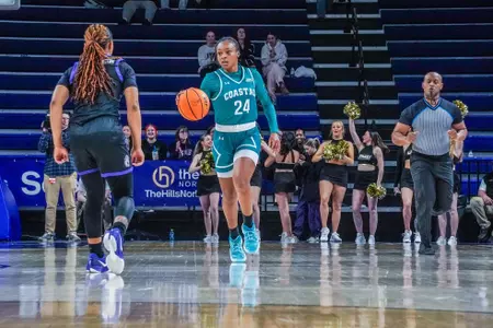 Jayden Marable drives against JMU on 1/26/2025