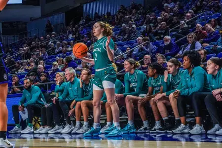 Savannah Brooks passes ball in against JMU on 1/26/2025
