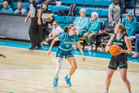 Kristin Williams defends against Marshall player on 1/29/2025