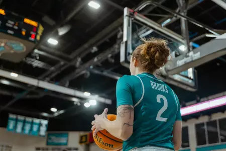 Savannah Brooks passes ball in against Marshall on 1/29/2025
