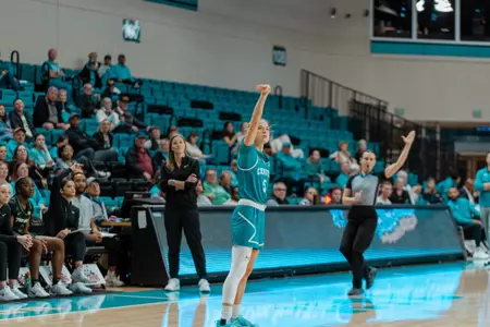 Kristin Williams shoots three against Marshall on 1/29/2025
