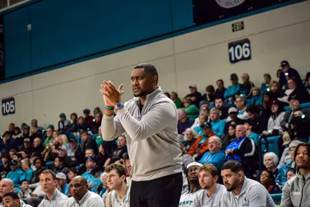 Justin Gray coaches against Marshall on 1/18/2025
