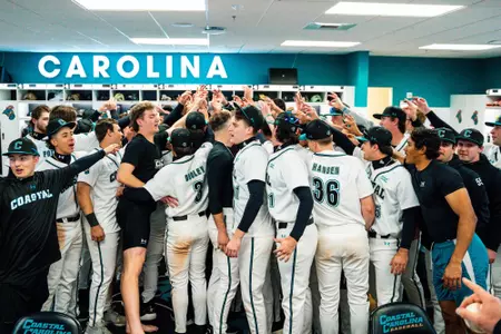Baseball celebrates in locker room following win over SJU on 2/14/2025