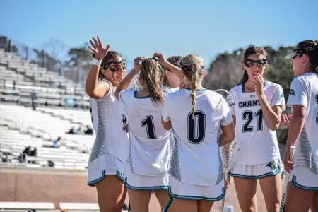 Lacrosse celebrates goal over Charlotte on 2/14/2025