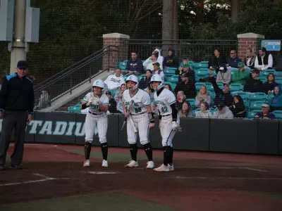 Softball celebrates home run against ND on 2/14/2025