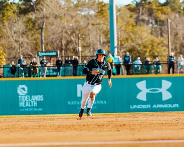 Caden Bodine runs bases against Kansas State on 2/17/2025