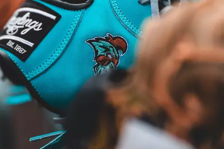 Coastal glove up close in dugout in Jacksonville on 2/20/2025