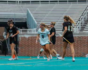 Brigid Cardillo celebrates goal against William & Mary on 2/8/2025
