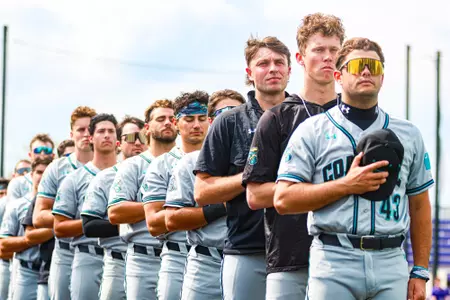 Baseball stands for nation anthem before Friday night game at JMU