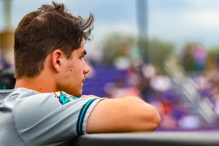 Dom Tozzi in dugout at JMU on 4/25/2025