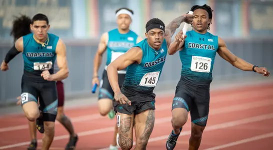 Garrett Wilkins competes in a relay at the Myrtle Beach Collegiate Challenge on March 8, 2024. Photo by Scott Dean