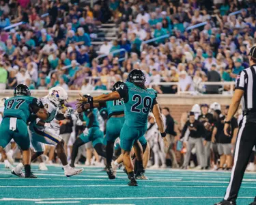 Emile Sebafundi punts ball against ECU on 9/13/2025