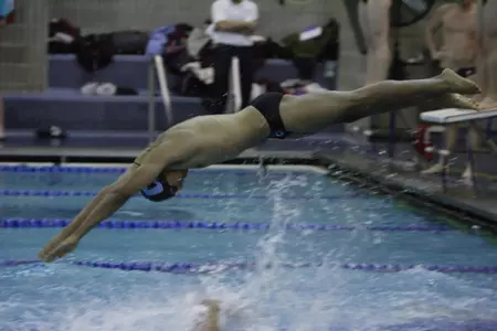 Powell Sets Two Pool Records, Pacing Men?s Swimming & Diving to Win Over Penn