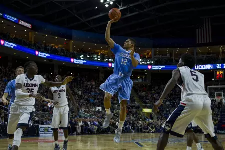 Men's Basketball Clipped at UConn