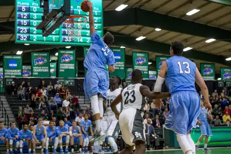 Petrasek's Late 3-Pointer Lifts Men's Basketball Past Manhattan, 72-71