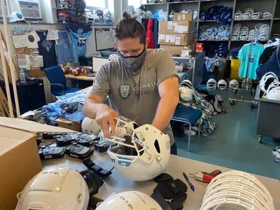 Jake Corbett Works on Equipment
