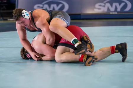 Danny Conley wrestles in a match against Harvard last season.