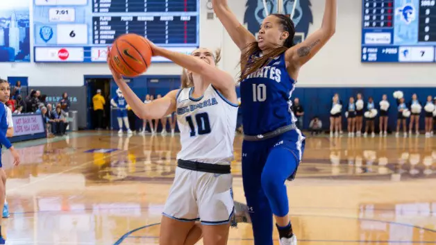 Kitty Henderson Driving on SHU Headline Crop WNIT 2022