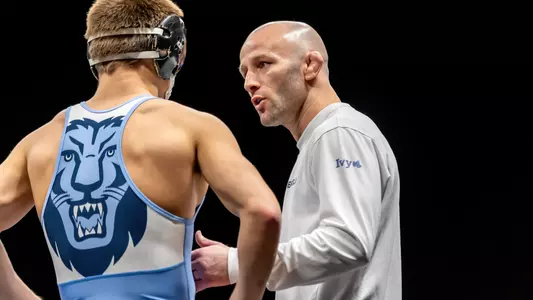 Zach Tanelli Coaching in Columbia's Match vs. West Virginia